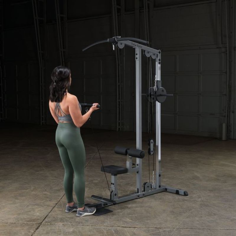 Body-Solid Pro Lat Machine - GLM85B Standing Woman Bicep Curl