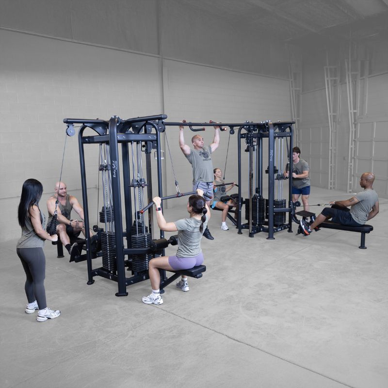 Body-Solid Pro Clubline SJG800 8-Stack Jungle Gym Main Display with People Working out