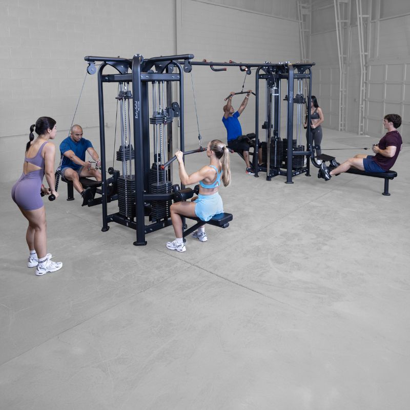 Body-Solid Pro Clubline SJG800 8-Stack Jungle Gym Side View with Full of People Working out