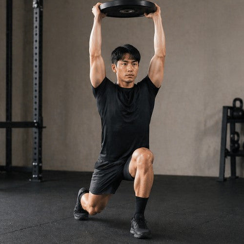 Overhead Lunges with Weight Plates: Strength, Balance, and Total-Body Control - Dumbbells Direct Guide