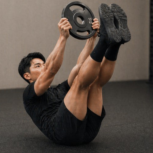 Toe Touch Crunch with Weight Plates: Form, Strength, and Core Training - Dumbbells Direct Guide