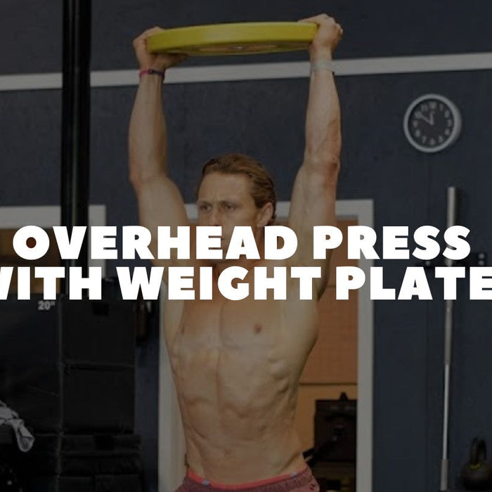 overhead press  with weight plates - Dumbbells Direct Guide