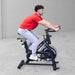 A man working out using Body Solid Best Fitness BFSB5B Indoor Training Cycle inside gym