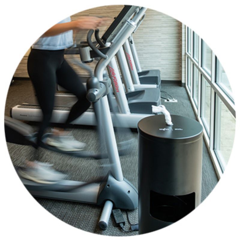 Antibacterial Disinfecting Wipes (4 rolls_case) + Black Coated Dispensers beside treadmill