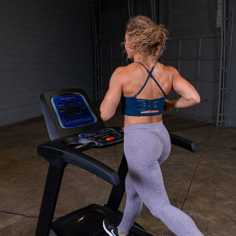 Body-Solid Endurance Folding Treadmill - T25 Female Running