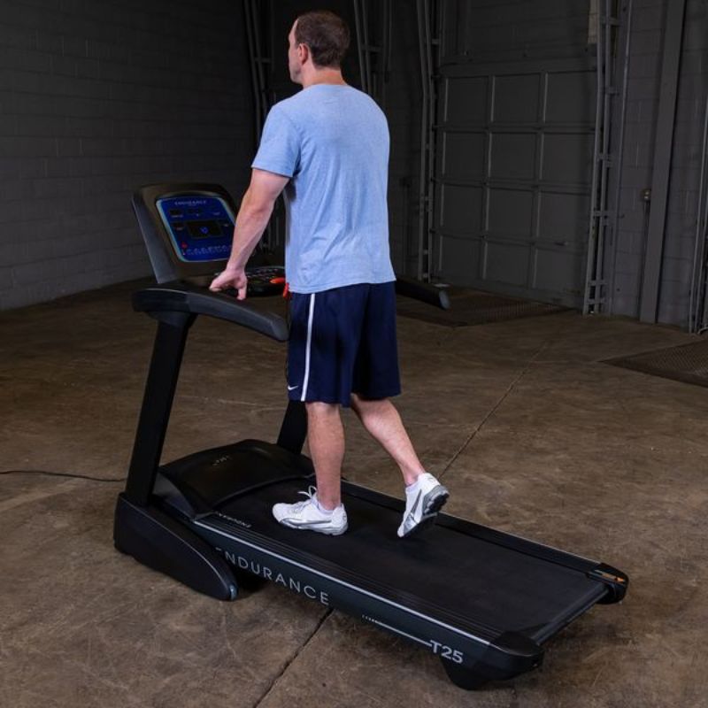 Body-Solid Endurance Folding Treadmill - T25 Male Walking