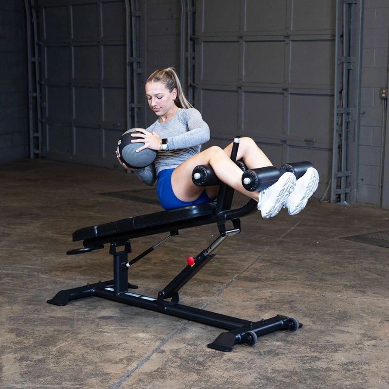 Body-Solid Pro Clubline Commercial Ab Bench SAB500B used in russian twist