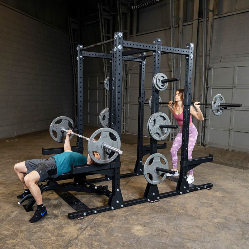 Body-Solid Pro Clubline Double Half Rack - SPR500DBL Main Display Male Bench Press Workout and Female Squat Workout