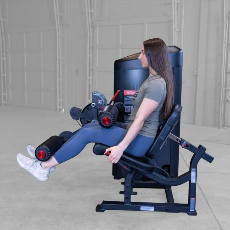 Body-Solid Series II Leg Extension & Leg Curl - S2LEC Leg Extension Exercise Side View Female