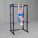 Body Solid Best Fitness BFPR100B Power Rack used in knee raise