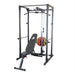 Body Solid Best Fitness BFPR100B Power Rack with Bench, lat pullown attachment, and weight plates