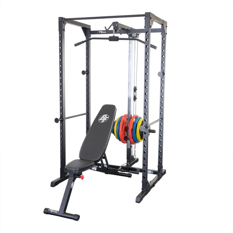 Body Solid Best Fitness BFPR100B Power Rack with Bench, lat pullown attachment, and weight plates