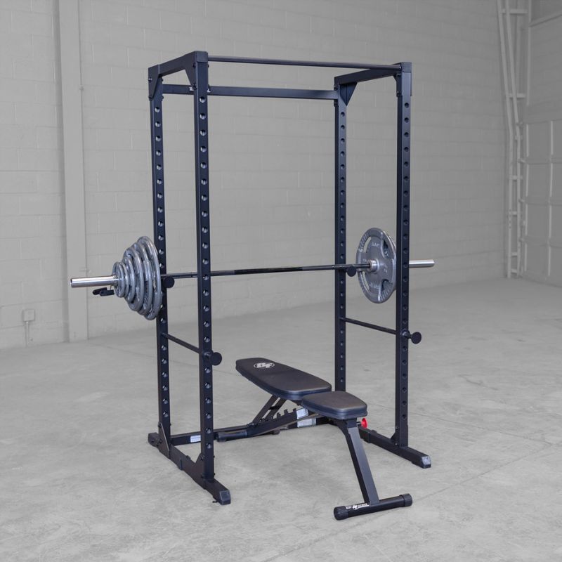 Body Solid Best Fitness BFPR100B Power Rack with bench, bar, and weight plates