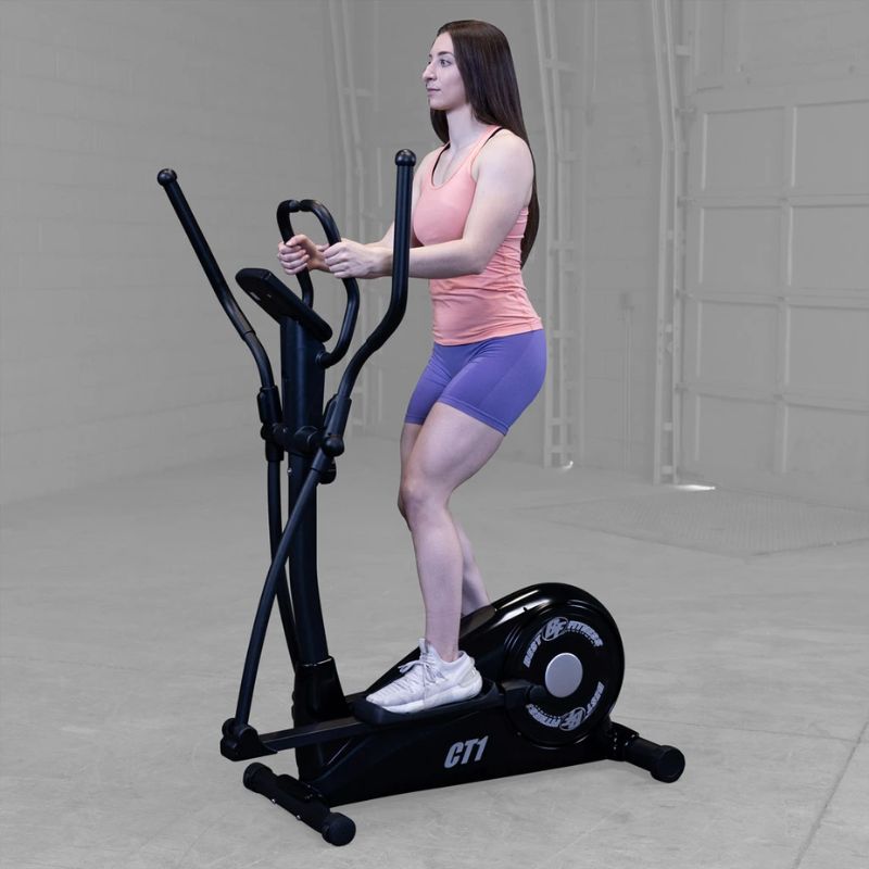 Body Solid Best Fitness Cross Trainer Elliptical - BFCT1B used by a female athlete side view (other side)