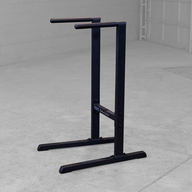 Body Solid GDIP59B Dip Station Angled View inside gym