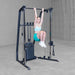 Female 2 Doing Knee Raise using Body-Solid Best Fitness BFFT10B Functional Trainer