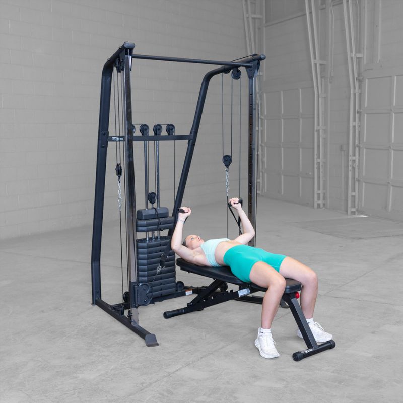 Female 2 doing Cable Bench press using Body-Solid Best Fitness BFFT10B Functional Trainer