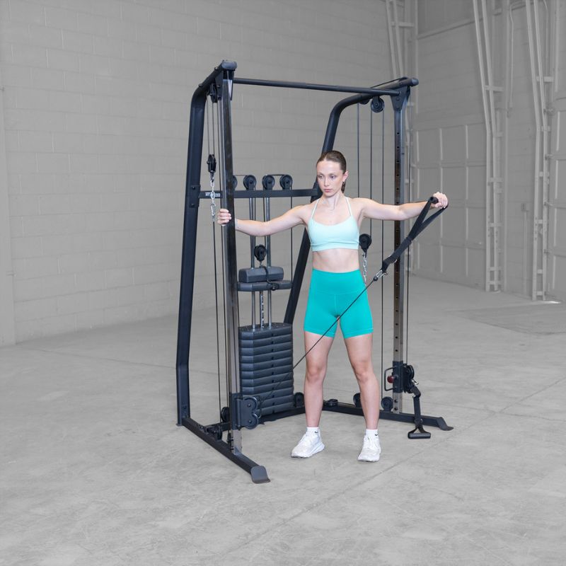 Female 2 doing Cable Lateral Raise using Body-Solid Best Fitness BFFT10B Functional Trainer