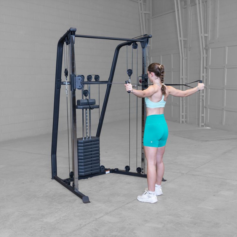 Female 2 doing Cable Rear delt fly using Body-Solid Best Fitness BFFT10B Functional Trainer