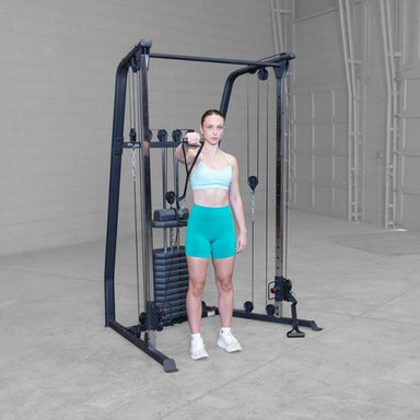 Female 2 doing Cable front raise using Body-Solid Best Fitness BFFT10B Functional Trainer