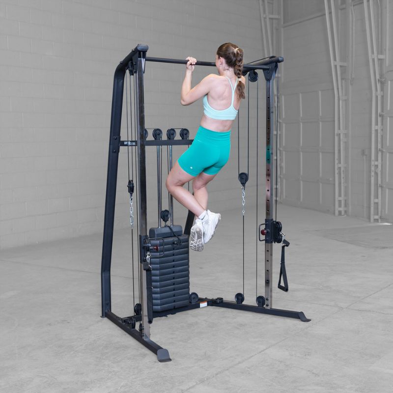 Female 2 doing Chin Up using Body-Solid Best Fitness BFFT10B Functional Trainer