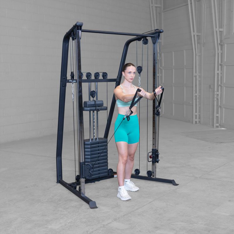Female 2 doing Low to High Chest Fly using Body-Solid Best Fitness BFFT10B Functional Trainer