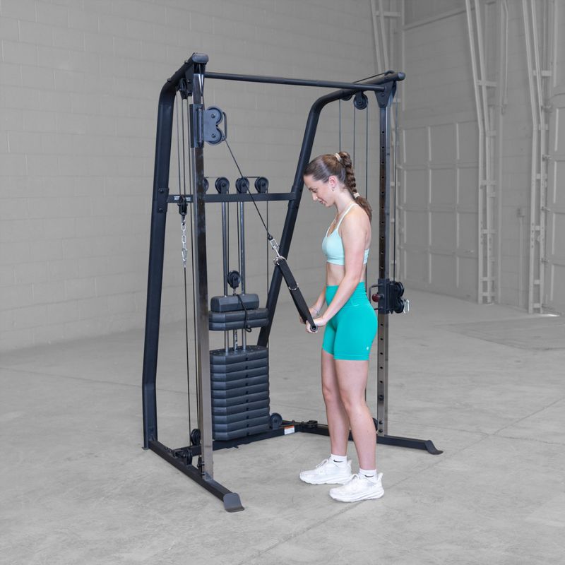 Female 2 doing Tricep extension using Body-Solid Best Fitness BFFT10B Functional Trainer