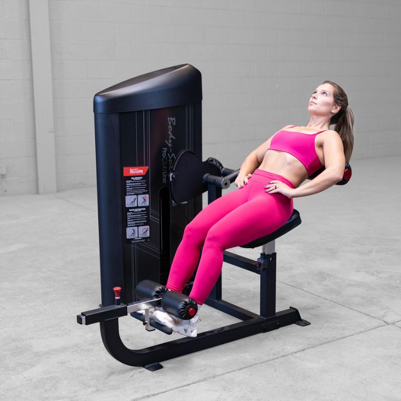 Female instructor doing Back Extension using Body-Solid Pro ClubLine Series 2 Ab and Back S2ABBX
