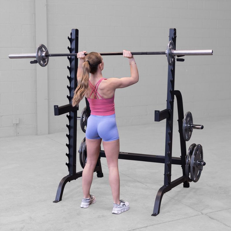 Female doing Barbell military press using Body-Solid GPR370B Olympic Multi Press Rack