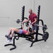 Female doing Decline Barbell Bench press using Body-Solid GPR370B Olympic Multi Press Rack