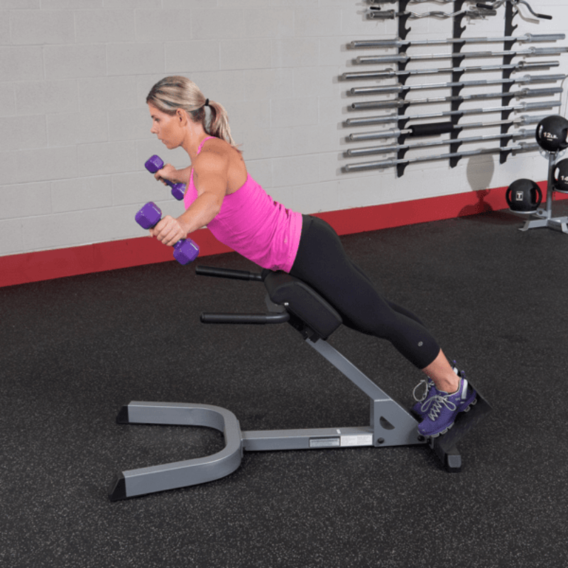 GHYP345  Body Solid 2x3 45 Degree Back Hyper Extension Sample Exercise with Dumbbell
