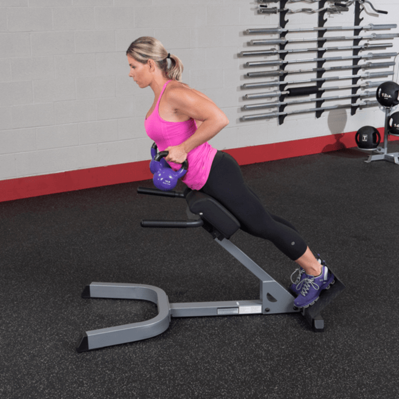 GHYP345  Body Solid 2x3 45 Degree Back Hyper Extension Sample Exercise with Kettlebell