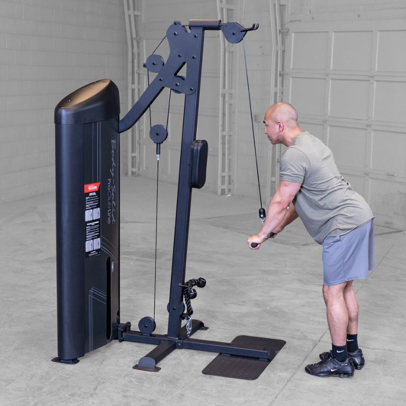 Left Side view of a man doing tricep extension using Body-Solid Pro ClubLine S2BTPX Series 2 Biceps and Triceps