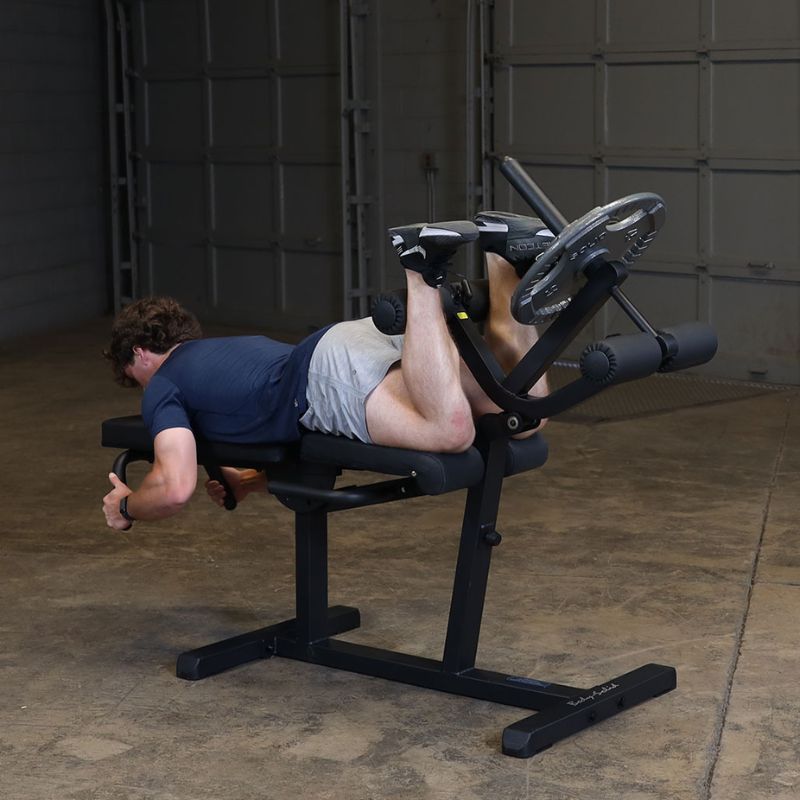 Leg Curls with weight Plates using Body-Solid GLCE365B Leg Extension Curl Machine