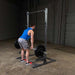 PPR500  Body Solid Powerline Half Rack Sample Exercise with Barbell