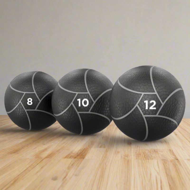 Power Systems Elite Power Medicine Ball Prime Gray 8 lb, 10 lb, and 12 lb medicine ball inside Gym