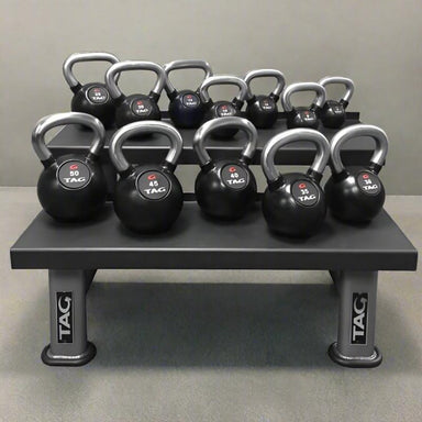 RKETL  TAG Fitness Rubber Encased Kettlebell with Chemical Chrome Handle Sample with Rack