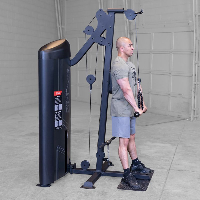 Right side view of a man doing tricep extension using Body-Solid Pro ClubLine S2BTPX Series 2 Biceps and Triceps