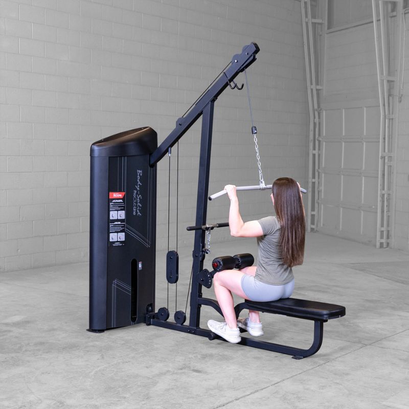 Side view of female doing lat pulldown using Body-Solid Pro ClubLine S2LATX Series 2 Lat and Mid-Row