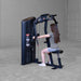 Side view position of rear delt workout using Body-Solid Pro Clubline S2PECX Series 2 Pec Fly & Rear Delt