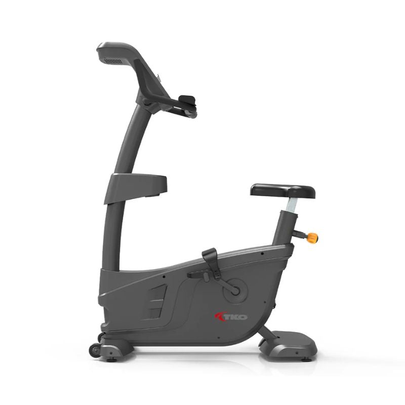 Side view of TKO Strength Cardio Upright Bike - 7UP-LED on a white background