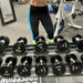 TAG Fitness Premium Ultrathane Dumbbell Set inside Gym