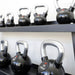 TAG Fitness Rubber Encased Kettlebell with Chemical Chrome Handle Set in Rack