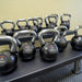 TAG Fitness Rubber Encased Kettlebell with Chemical Chrome Handle Set with TAG Fitness Rack