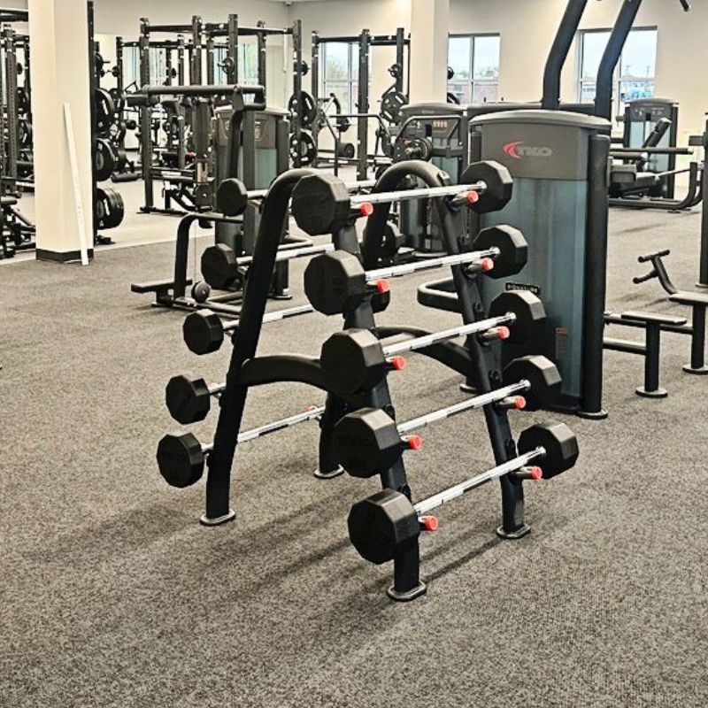 TKO 20-110lb rubber Straight barbells w_ 10 set rack inside gym