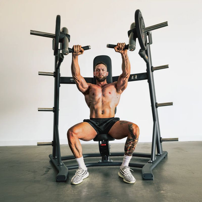 TKO Strength Unilateral Converging Incline Press used by Male Athlete inside gym