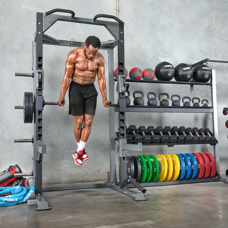 TKO Strength Half Rack with Storage - 921HR-STRG used inside gym with other accessories