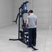 Working out using Body-Solid G3B Multi-Station Gym 10