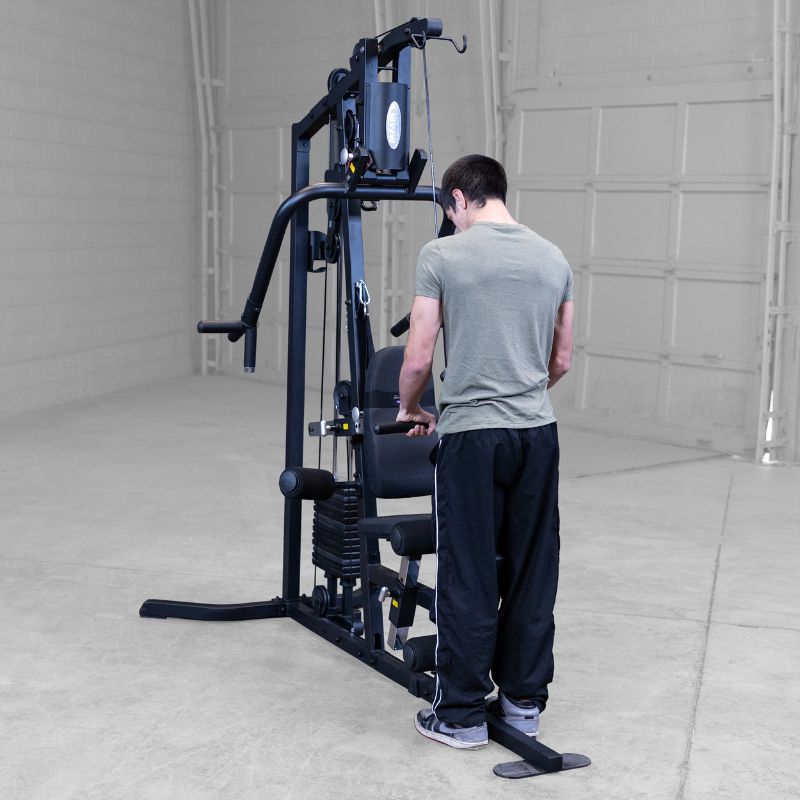 Working out using Body-Solid G3B Multi-Station Gym 10
