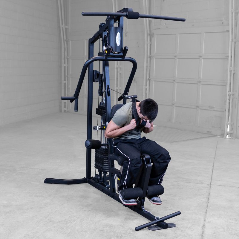 Working out using Body-Solid G3B Multi-Station Gym 11